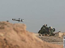U.S. Marines fire a Javelin missile at Iraqi troops in Umm Qasr, Iraq