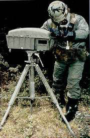 A soldier demonstrating the use of a bioweapons detection unit