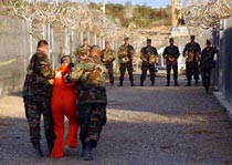 A detainee at Camp X-ray in Guantanamo Bay, Cuba, in 2002