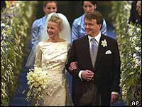 Prince Johan Friso and his wife Mabel exit the church after their wedding