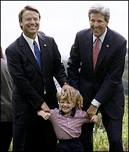Senator John Edwards (left) and Senator John Kerry with Edwards' son.