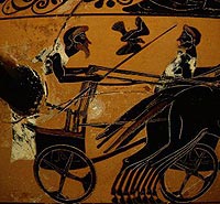 Art on an ancient vase illustrating chariot racers.