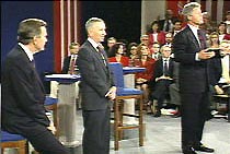 The first town-hall style debate in 1992 brought together George Bush, Ross Perot, and Bill Clinton.