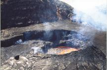Molten lava at the mouth of a volcano in Hawai'i.