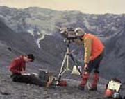 Scientists monitoring activity near a volcano.