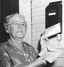 A senior citizen receives her first Social Security check.