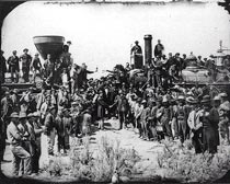 The gold spike officially connected the Union Pacific and Central Pacific lines to form the Transcontinental Railroad.