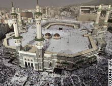 Muslims pray at the Grand Mosque in Mecca, in preparation for Hajj.